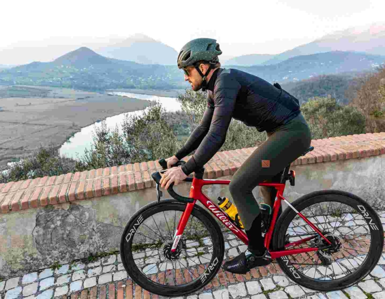A Cyclist Riding a Wilier Road Bike With Elitewheels Drive 50 in Italy